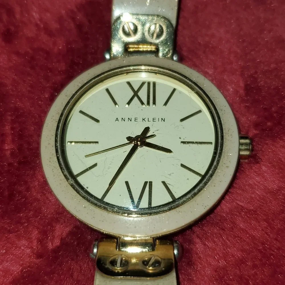 Anne Klein Women's AK-1408CRCR‎ Gold Plastic Analog Quartz Bangle Style Watch